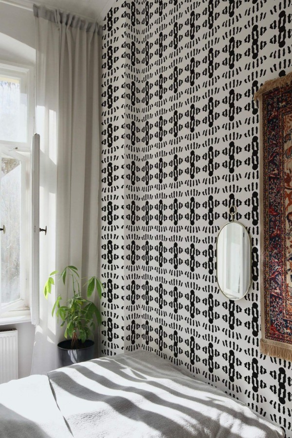 Bohemian style bedroom decorated with Geometric abstract stripes peel and stick wallpaper