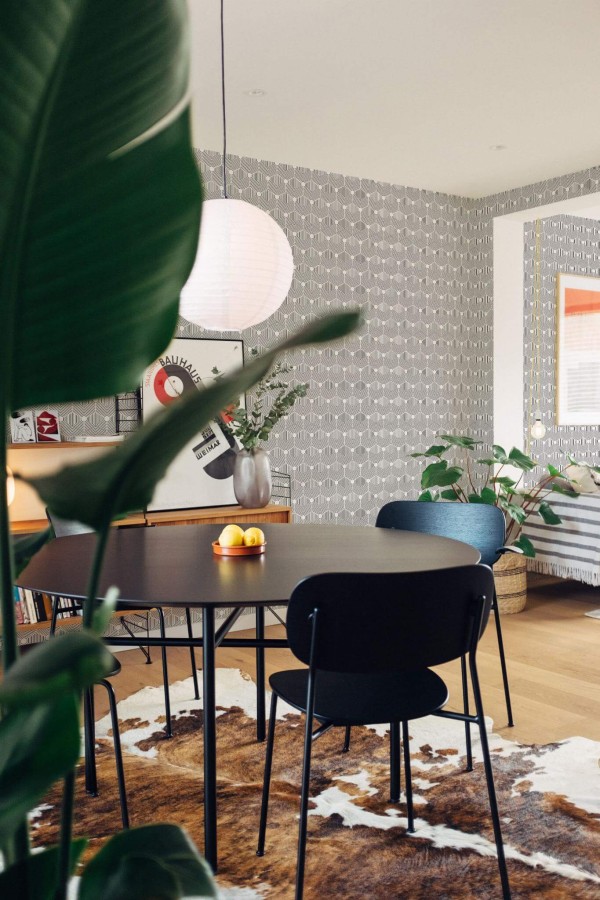 Scandinavian style dining room decorated with Geometric Hexagon peel and stick wallpaper