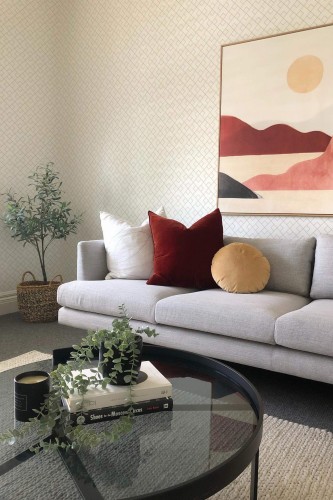 Boho style living room decorated with Geometric squared peel and stick wallpaper