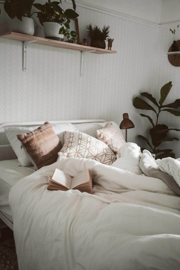 Boho style bedroom decorated with Gray braid peel and stick wallpaper