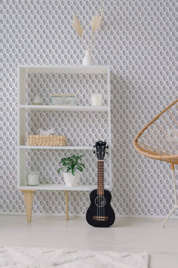 Minimal boho style living room decorated with Gray geometric triangle peel and stick wallpaper