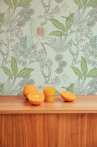 Mid-century style living room decorated with Green cactus peel and stick wallpaper