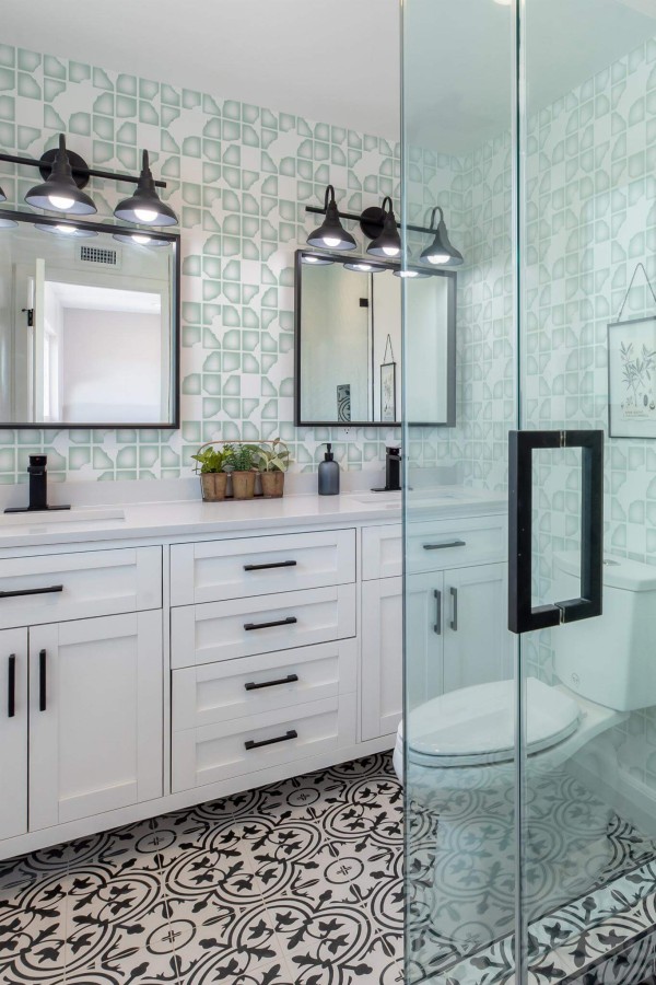 Rustic farmhouse style bathroom decorated with Green modern abstract peel and stick wallpaper