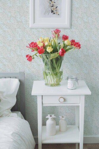 Farmhouse style bedroom decorated with Green neutral leaf peel and stick wallpaper