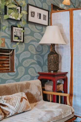 Southwestern style living room decorated with Green paisley peel and stick wallpaper
