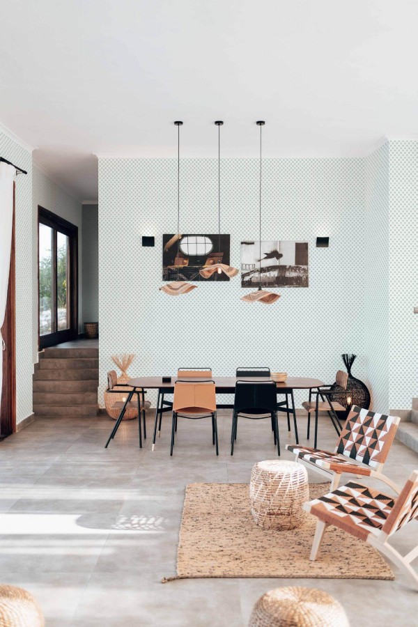 Modern boho style living dining room decorated with Green small leaf peel and stick wallpaper