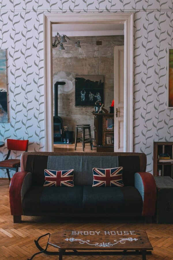 Industrial rustic style living dining room decorated with Green vines peel and stick wallpaper