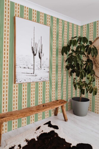 Fancy Walls traditional wallpaper inspired by vintage green stripes for a bold and dynamic look.