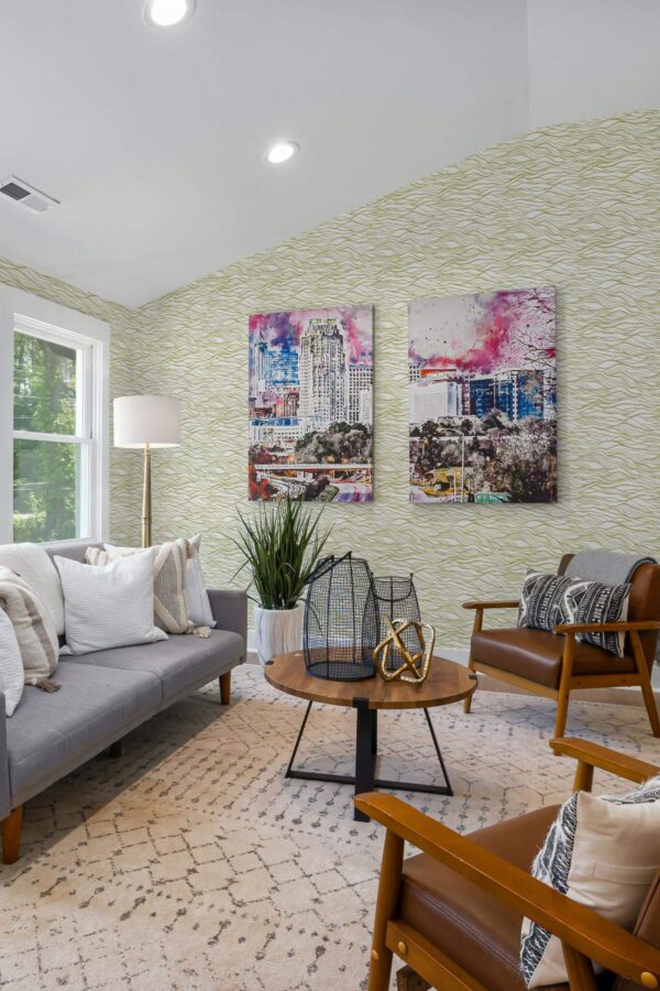 Mid-century modern style living room decorated with Green waves peel and stick wallpaper and colorful funky artwork