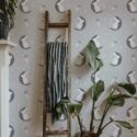 Scandinavian style living room decorated with Grey bunny nursery peel and stick wallpaper