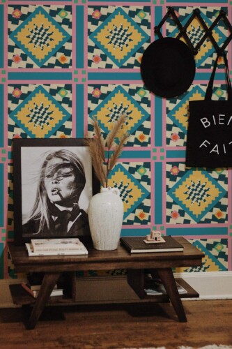 Rustic farmhouse style entryway decorated with Groovy rug peel and stick wallpaper