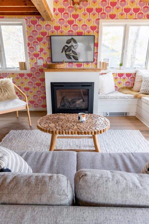 Farmhouse boho style living room decorated with Groovy tulips peel and stick wallpaper