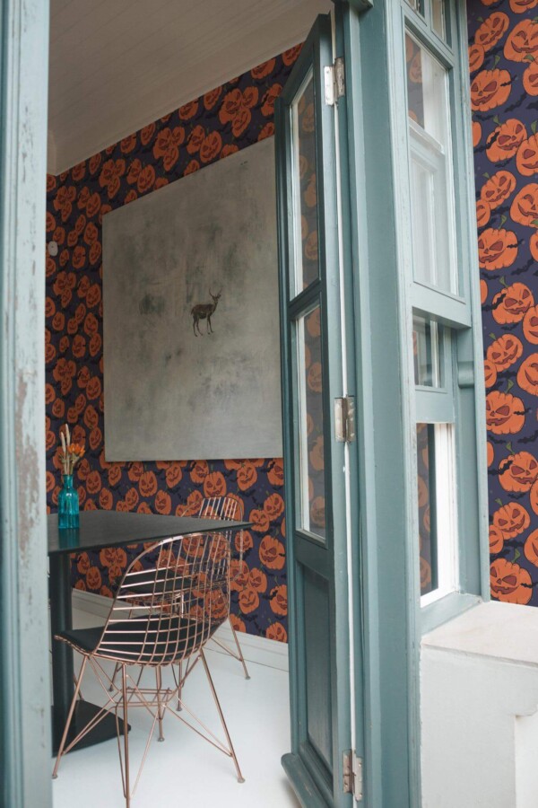 Minimal coastal style cafe decorated with Halloween Pumpkin peel and stick wallpaper
