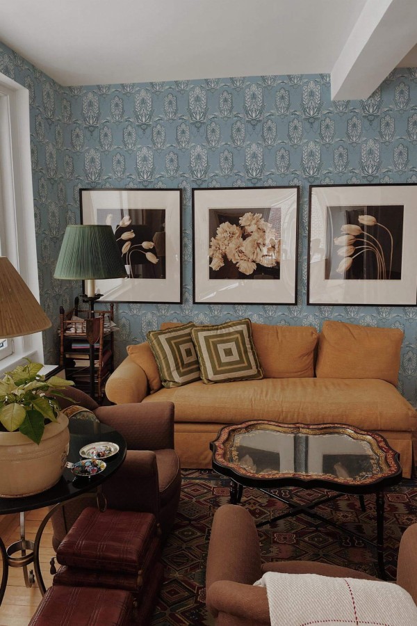 Mid-century eclectic style living room decorated with Hamsa hand peel and stick wallpaper