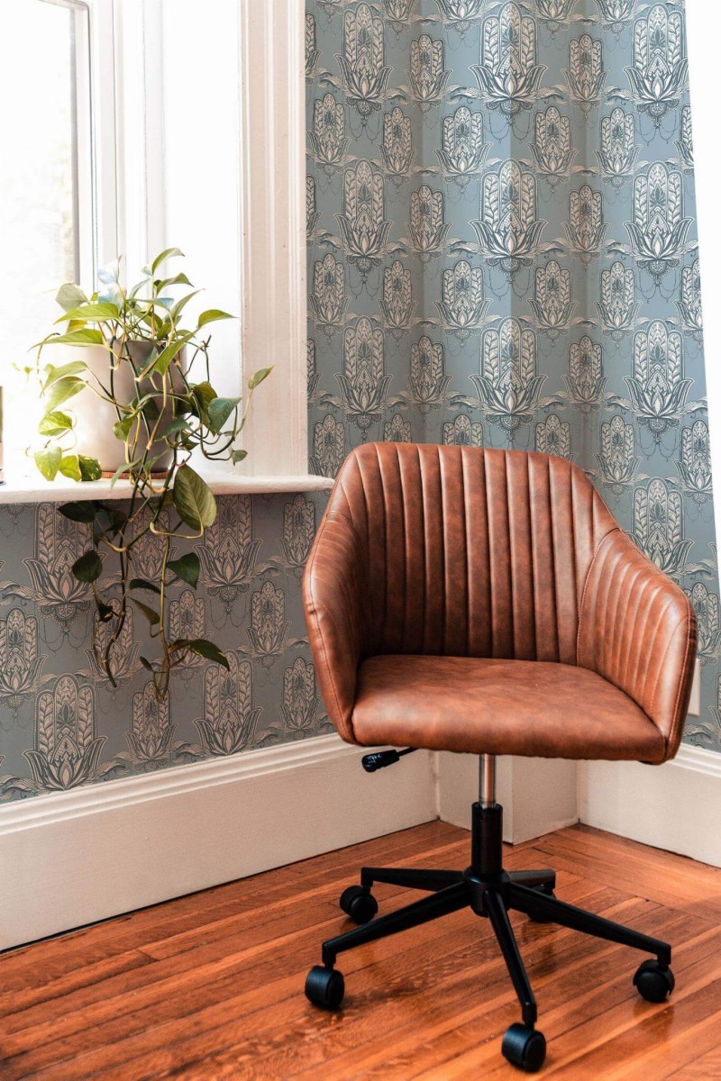 Mid-century modern style living room decorated with Hamsa hand peel and stick wallpaper