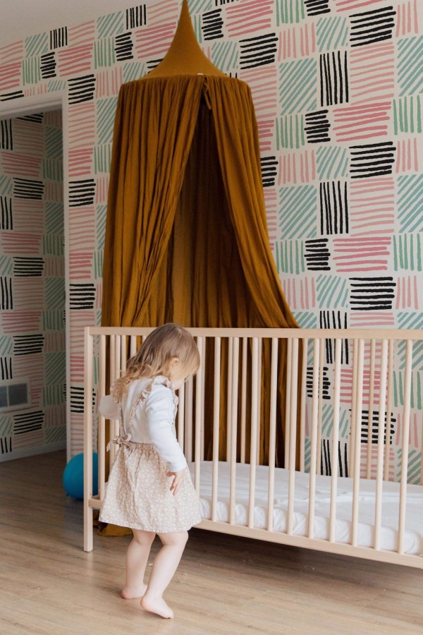 Neutral style nursery decorated with Hand drawn lines peel and stick wallpaper