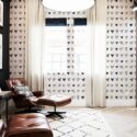 Mid-century modern style living room decorated with Handdrawn hearts peel and stick wallpaper