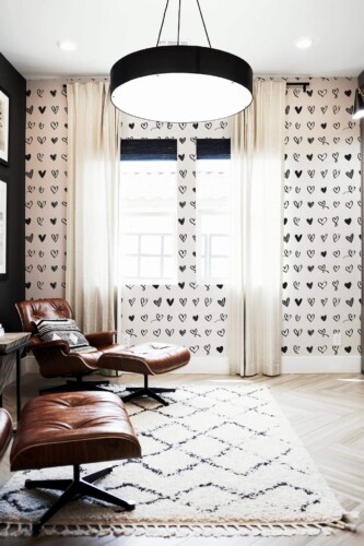 Mid-century modern style living room decorated with Handdrawn hearts peel and stick wallpaper