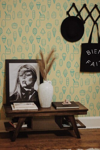 Rustic farmhouse style entryway decorated with Ice cream doodles peel and stick wallpaper