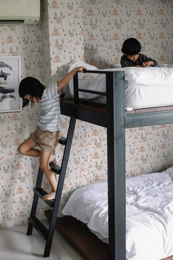 Minimalistic style kids room decorated with Indian rabbit peel and stick wallpaper