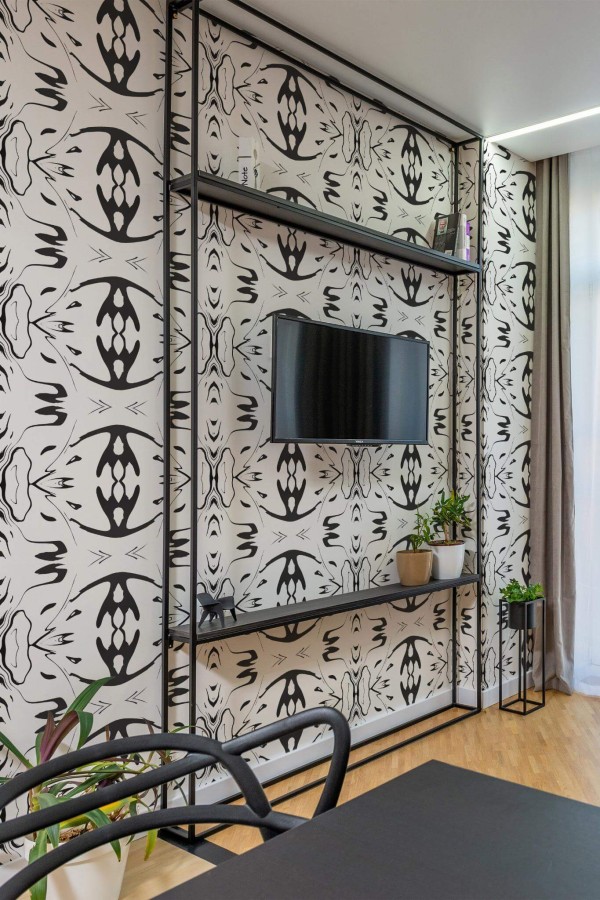 Industrial style living room decorated with Ink marble peel and stick wallpaper