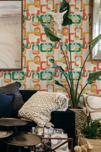Scandinavian style living room decorated with Interwined retro peel and stick wallpaper