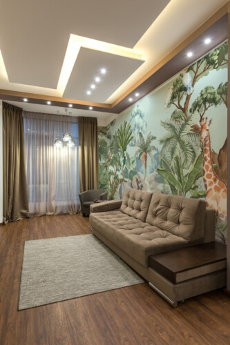 Safari wall mural peel and stick design by Fancy Walls showing elephants giraffes and lush jungle foliage