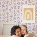 Fancy Walls kawaii-inspired Pink Animal unpasted wallpaper for cozy interiors.