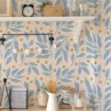 Light farmhouse style kitchen decorated with Leaf dot peel and stick wallpaper