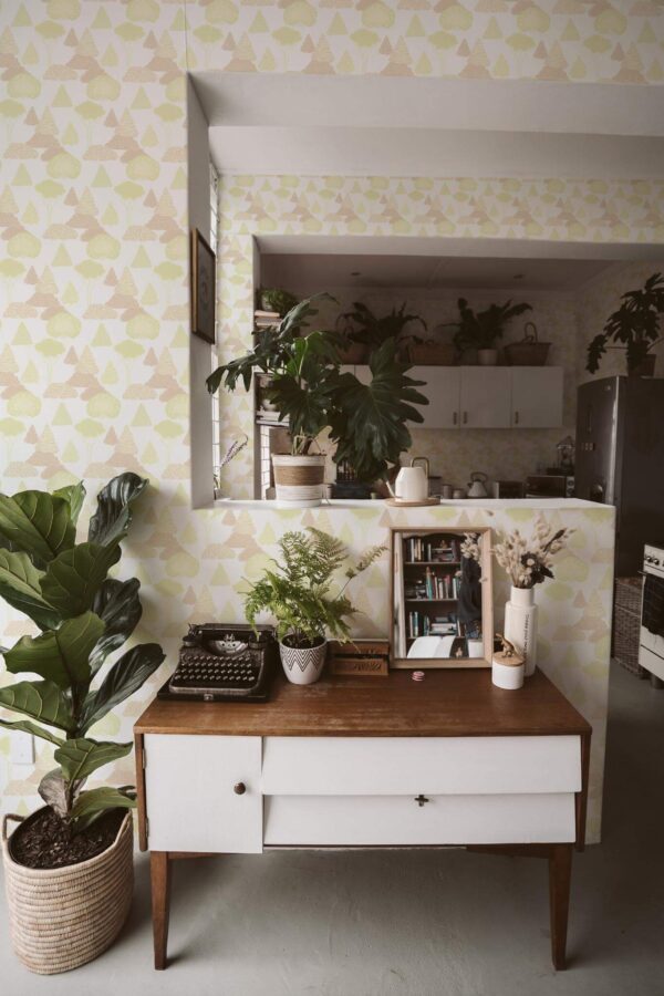 Boho style living room and kitchen decorated with Light forest peel and stick wallpaper and green plants