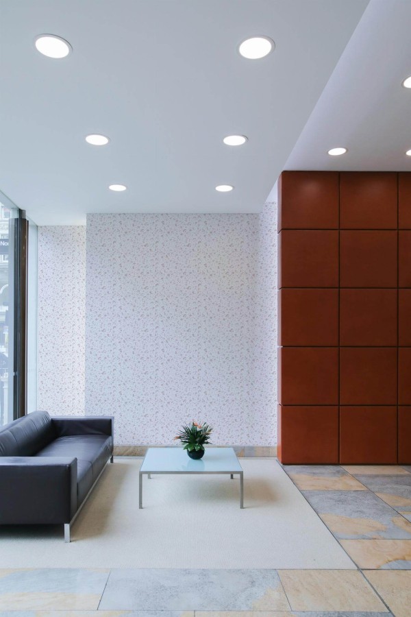Minimal mid-century style living room decorated with Light pink terrazzo peel and stick wallpaper