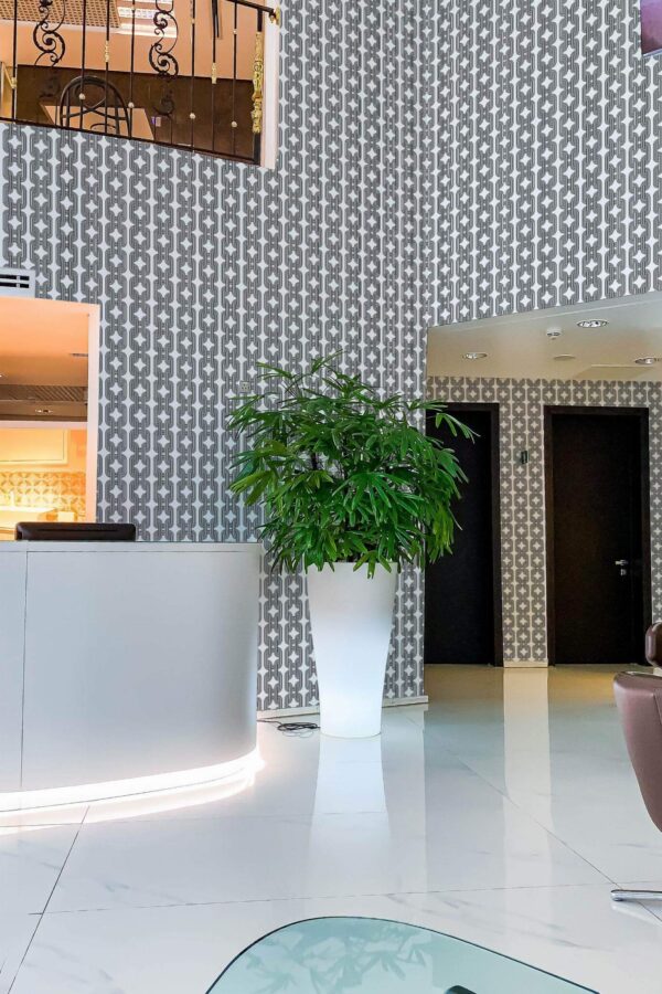Modern style hallway in a hotel decorated with Line art chain peel and stick wallpaper