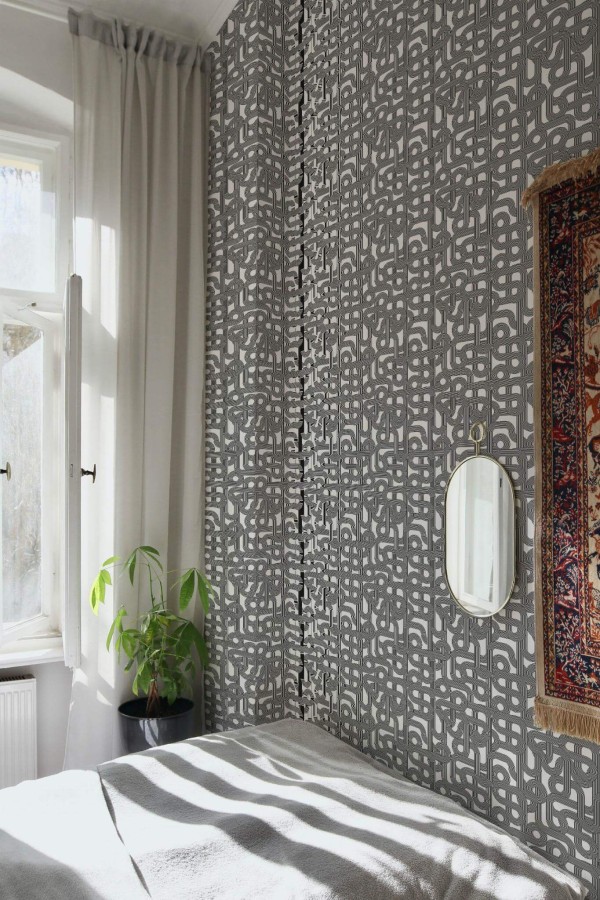 Bohemian style bedroom decorated with Line art pattern peel and stick wallpaper