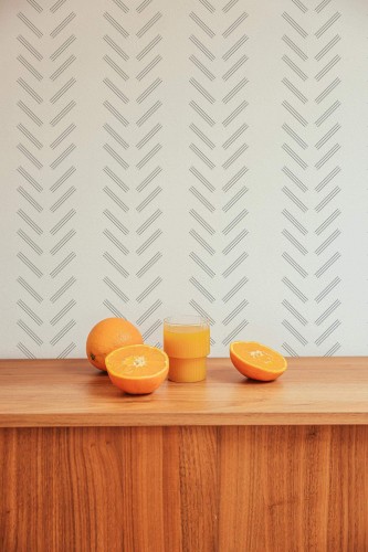 Mid-century style living room decorated with Line herringbone peel and stick wallpaper