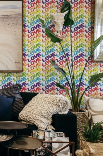 Scandinavian style living room decorated with Love is love peel and stick wallpaper