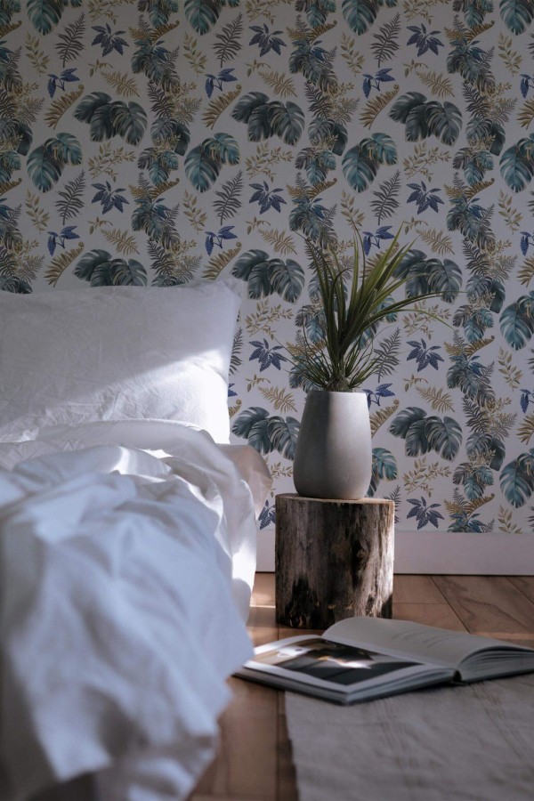 Minimal scandinavian style bedroom decorated with Lush tropical leaf peel and stick wallpaper