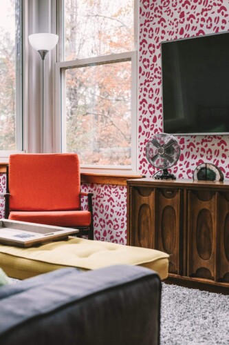 Rustic style living room decorated with Magenta leopard print peel and stick wallpaper