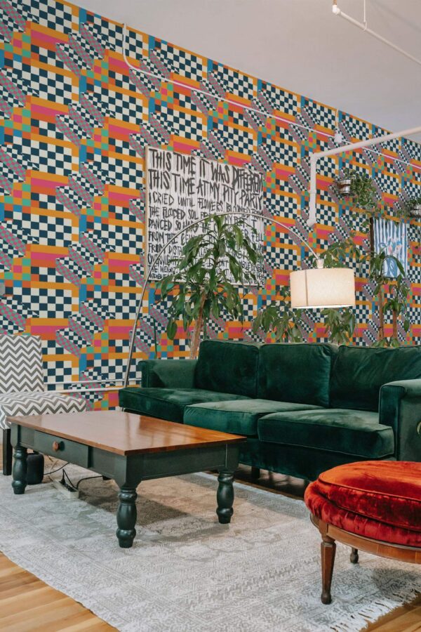 Bold eclectic style living room decorated with Maximalist pattern peel and stick wallpaper and emerald green sofa