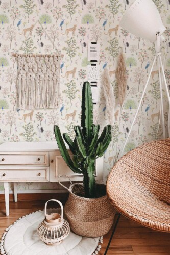 Bohemian style living room decorated with Menagerie peel and stick wallpaper