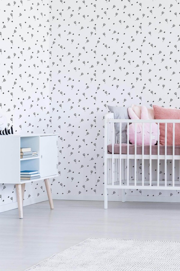 Minimal girly style nursery decorated with Minimalistic dandelion floral peel and stick wallpaper