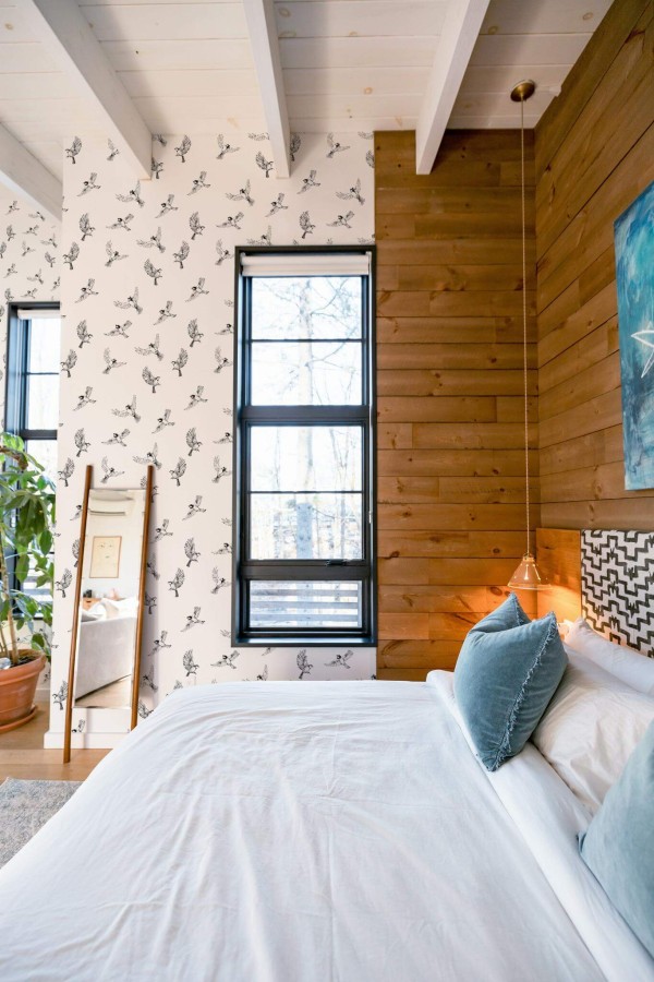 MId-century style bedroom decorated with Minimalistic sparrow peel and stick wallpaper