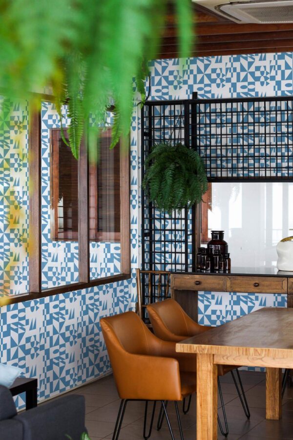 Mid-century modern style dining room decorated with Modernism geometric peel and stick wallpaper and black industrial accents