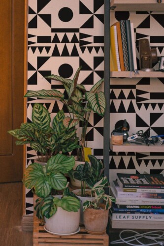 Southwestern style living room decorated with Modernist geometry peel and stick wallpaper