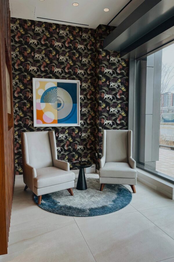 Mid-century-modern style living room decorated with Monkey dark botanic peel and stick wallpaper