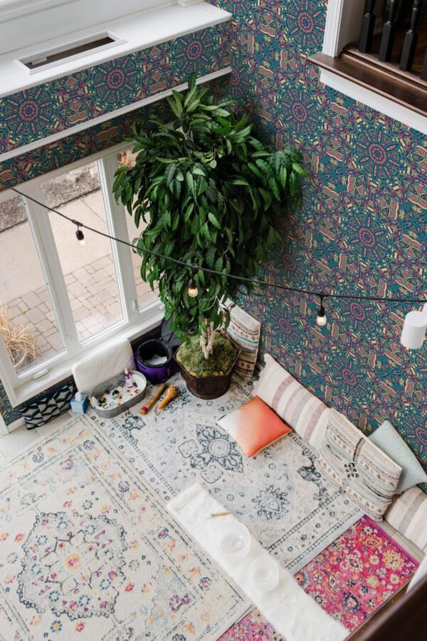 Boho style yoga room decorated with Morrocan mandala peel and stick wallpaper