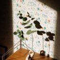 Mid-century style living room decorated with Mountain nursery peel and stick wallpaper