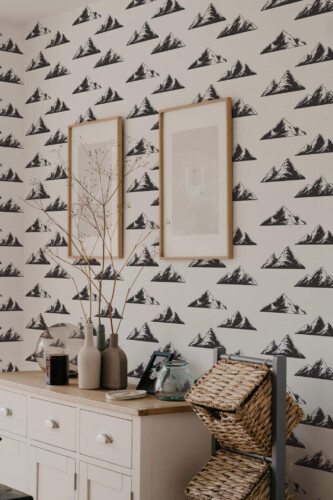 Scandinavian style bedroom decorated with Mountain peel and stick wallpaper