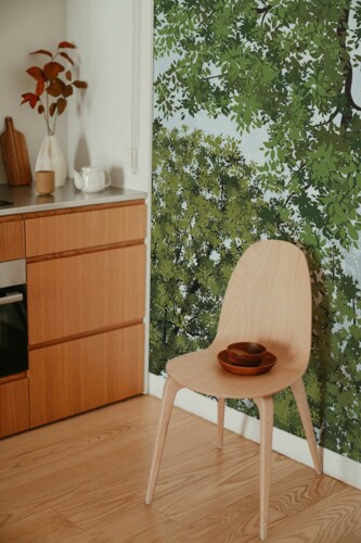 Tranquil Tree Dreams wall mural with green trees and a dreamy sky view, perfect for bedrooms, accent walls, or meditation spaces.