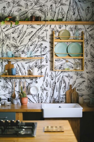 Sleek Monochrome Carrot wall mural with black and white hand-drawn carrot and leaf pattern, perfect for kitchen walls and dining spaces.