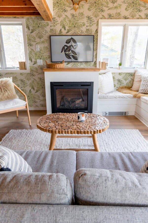 Farmhouse boho style living room decorated with Nature toile peel and stick wallpaper